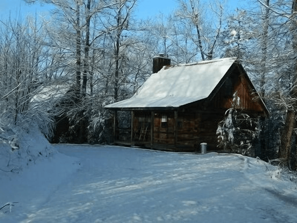 Cabin In Snow